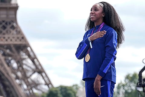 2012 London Olympics women's 400m hurdles: Lashinda Demus of the United States poses with her gold medal